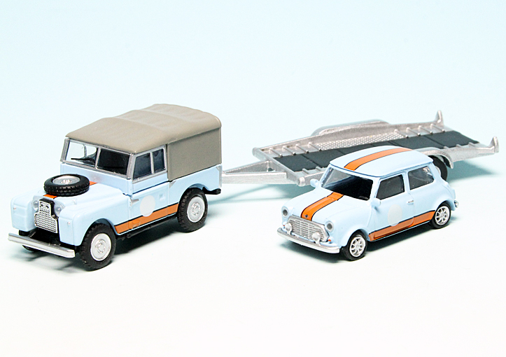 Schuco Land Rover Defender with Mini Cooper and Trailer British Racing 1//87